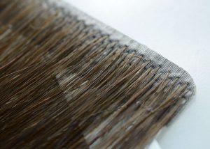 Injection tape hair extensions