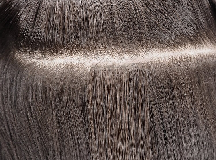 Extensiones de cabello invisibles con cinta adhesiva